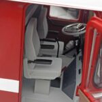 Mercedes O317 Porsche Transporter Roșu CMR 1:18 - image 11 of 12