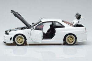 Nissan Skyline GT-R R34 Nismo Z-Tune Alb MotorHelix 1:18 M83407 Metal - imaginea 4 din 11