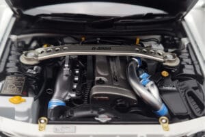 Nissan Skyline GT-R R34 Nismo Z-Tune Alb MotorHelix 1:18 M83407 Metal - imaginea 9 din 11