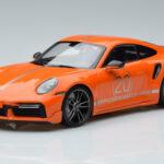 Porsche 911 992 Turbo S China 20th Anniversary Portocaliu Minichamps 1:18