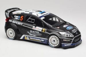 Ford Fiesta WRC #5 O. Tanak / R. Sikk Rally France 2012 Minichamps 1:18 151120805 Metal - imaginea 4 din 6