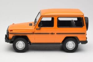 Mercedes G-Class W460 SWB Portocaliu Minichamps 1:18 155038000 Metal - imaginea 3 din 6
