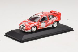 Ford Escort Cosworth Toshiba #11 A. Vatanen / Freeman 1994 Minichamps 1:43 430981811 Metal - imaginea 2 din 4