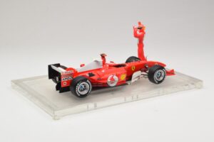 Ferrari F2004 #1 M. Schumacher F1 World Champion 2004 Cu Costum De Curse Hot Wheels 1:18 B66221 Metal - imaginea 2 din 6