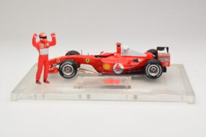 Ferrari F2004 #1 M. Schumacher F1 World Champion 2004 Cu Costum De Curse Hot Wheels 1:18 B66221 Metal - imaginea 3 din 6