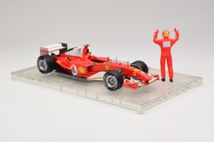 Ferrari F2004 #1 M. Schumacher F1 World Champion 2004 Cu Costum De Curse Hot Wheels 1:18 B66221 Metal - imaginea 4 din 6
