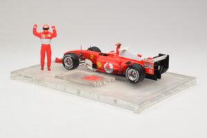 Ferrari F2004 #1 M. Schumacher F1 World Champion 2004 Cu Costum De Curse Hot Wheels 1:18 B66221 Metal - imaginea 5 din 6