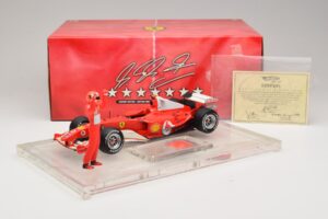 Ferrari F2004 #1 M. Schumacher F1 World Champion 2004 Cu Costum De Curse Hot Wheels 1:18 B66221 Metal - imaginea 6 din 6